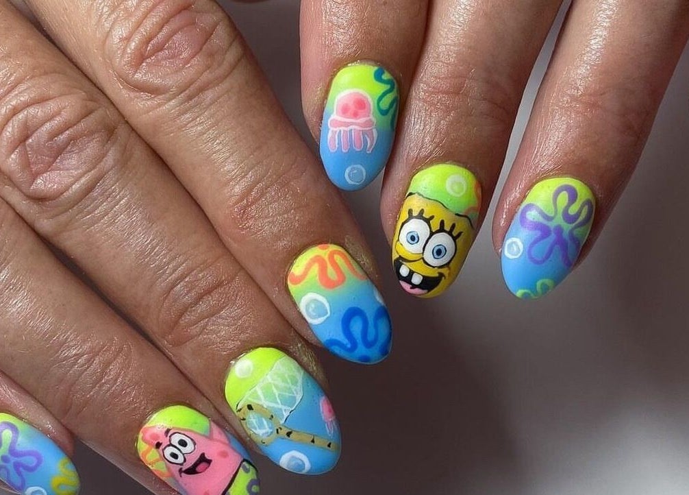 Colorful cartoon nail art at ZW Aesthetics, Howick, KwaZulu-Natal, ZA showcasing fun and creativity.