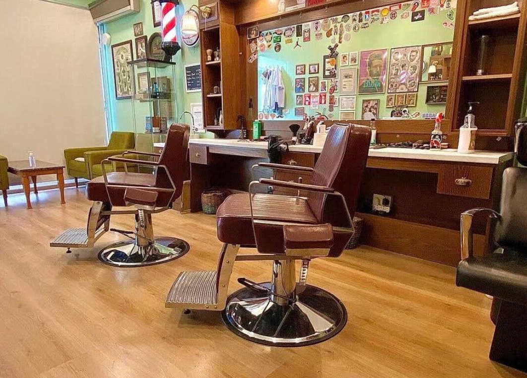 Elegant barber chairs at Antonio Barbero in Mesa Geitonia, Limassol, CY, showcasing a stylish interior.