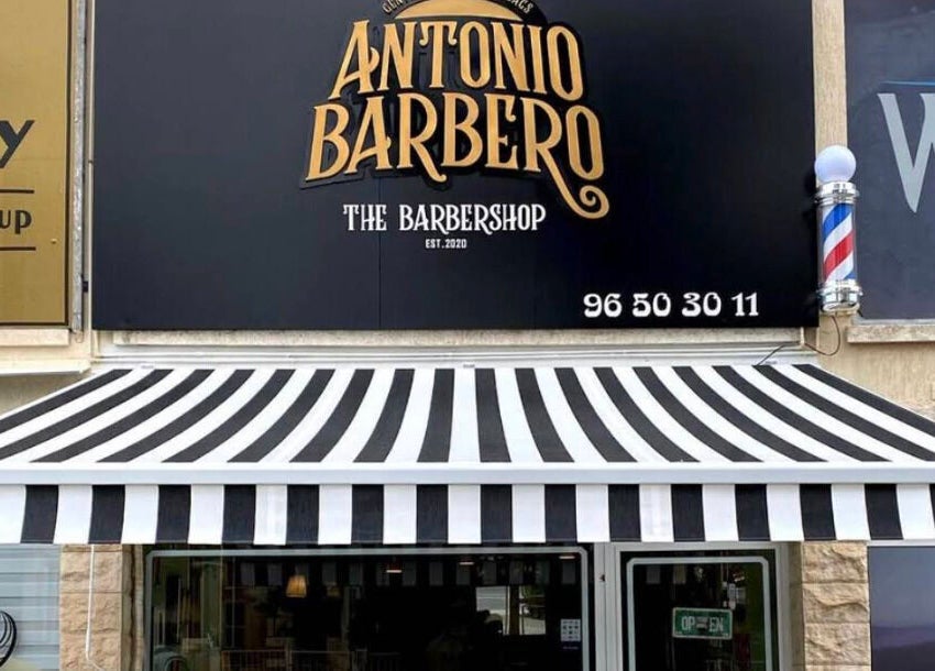 Antonio Barbero facade with striped awning in Mesa Geitonia, Limassol, CY.