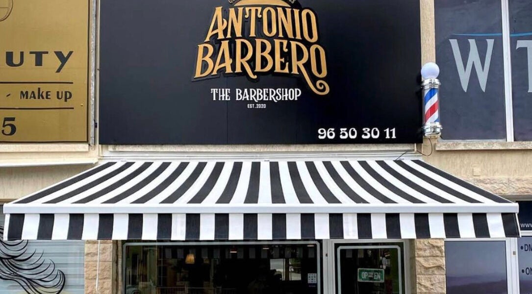 Antonio Barbero facade with striped awning in Mesa Geitonia, Limassol, CY.