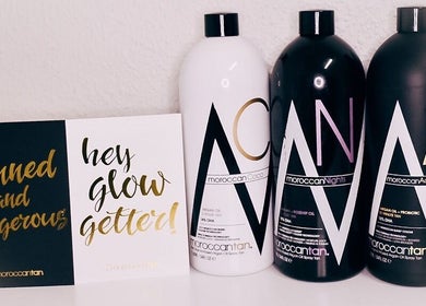 Luxury tanning products on display at Beleza Wellness, Benoni, Gauteng, ZA, promoting a radiant glow.
