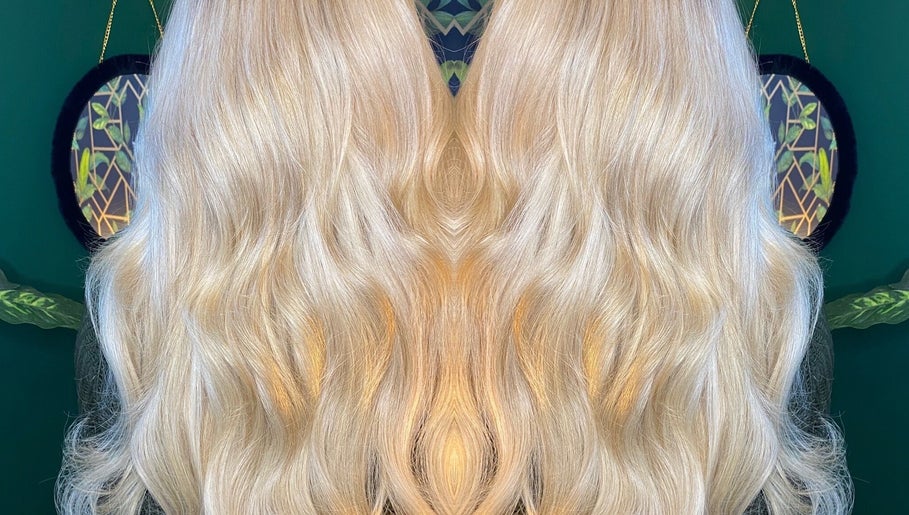 Elegant blonde waves styled at Moon Hair, East Ardsley, England, GB, showcasing luxurious hair texture.
