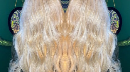 Elegant blonde waves styled at Moon Hair, East Ardsley, England, GB, showcasing luxurious hair texture.