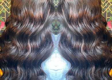 Voluminous wavy hair styled at Moon Hair, East Ardsley, England, GB, showcasing rich, glossy texture.