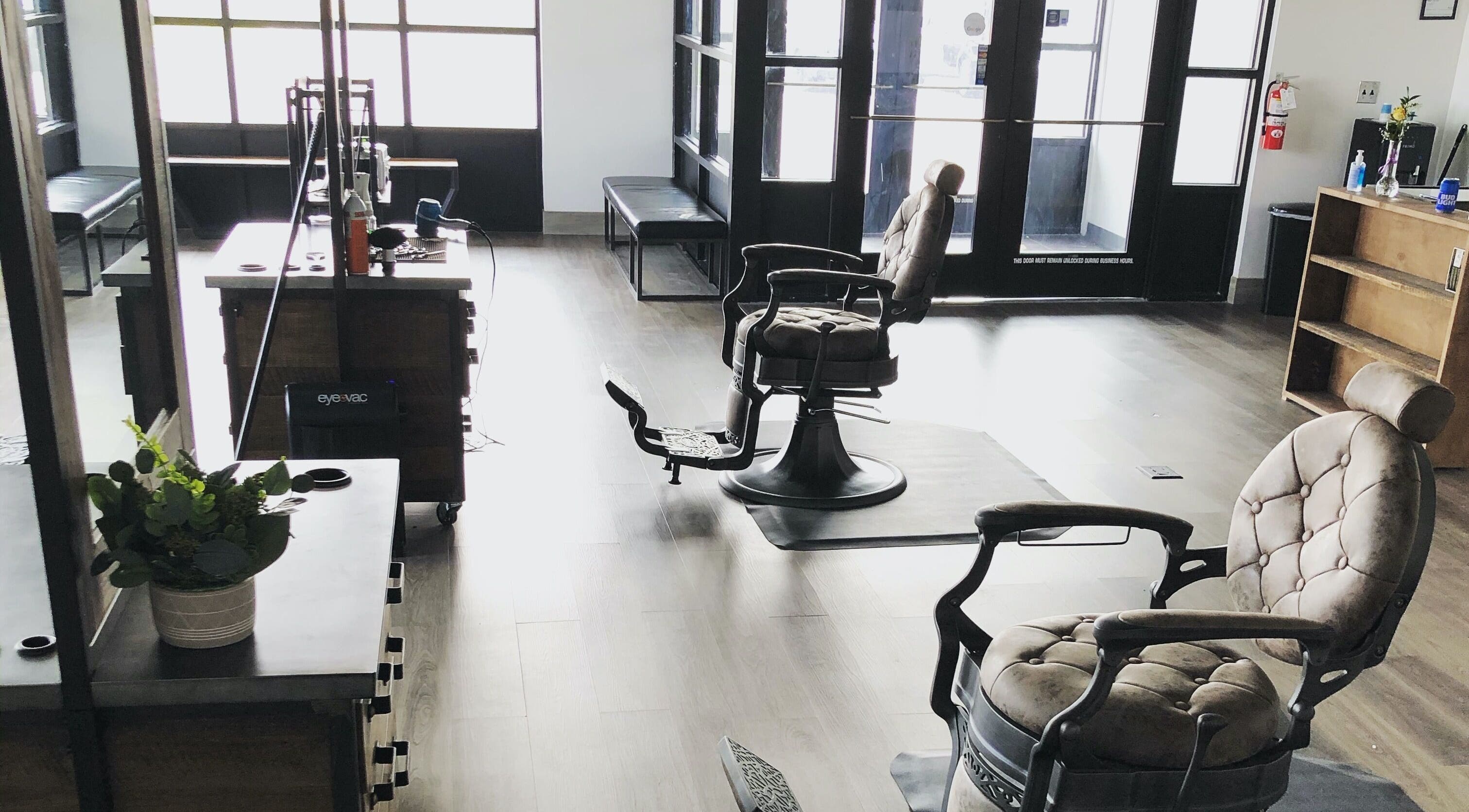 Cozy interior of Angie’s Barbershop in Billings, Montana, US with vintage styling chairs and modern decor.
