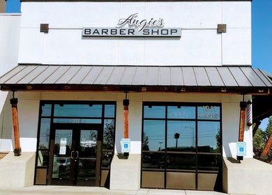 Front view of Angie’s Barbershop in Billings, Montana, US, featuring the storefront and signage.