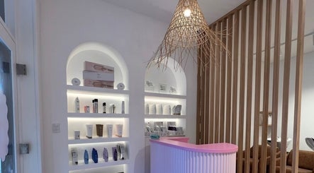 Stylish and inviting interior of Holly Rose Hair in Sydney, New South Wales, AU, highlighting beauty products.