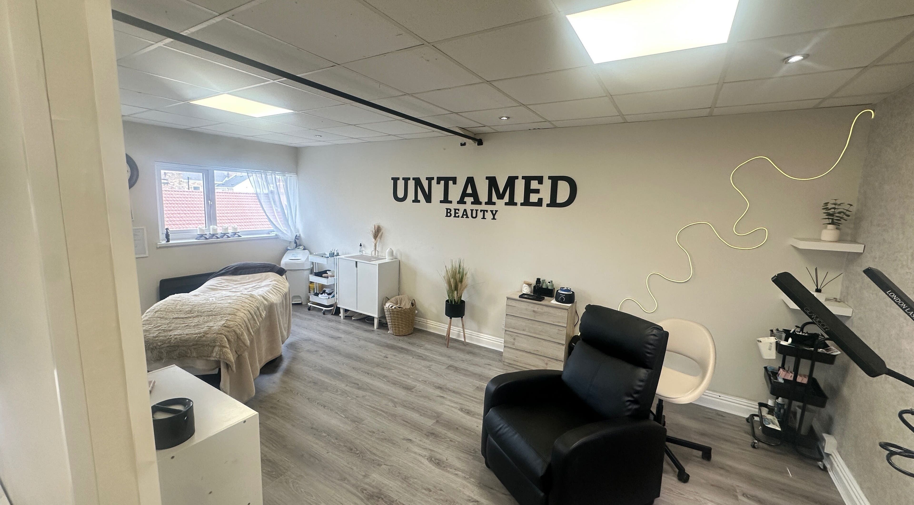 Serene treatment room at Untamed Beauty by Kelly in Consett, England, GB with soothing decor.