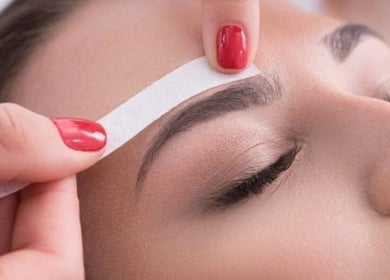 Eyebrow waxing service at The Look Hair, Nails & Beauty Salon in Zabbar, MT.