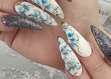 Exquisite floral nail art at The Look Hair, Nails & Beauty Salon in Zabbar, MT, showcasing creative designs.