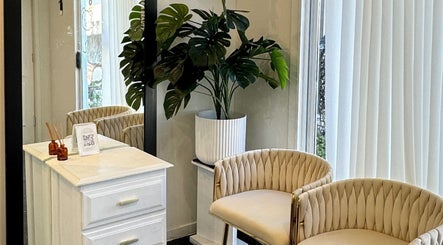 Cozy seating at Flashy Lashies & Beauty, Lethbridge Park, New South Wales, AU with chic decor.