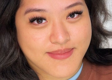 Client showcasing stunning lashes at Flashy Lashies & Beauty, Lethbridge Park, New South Wales, AU.
