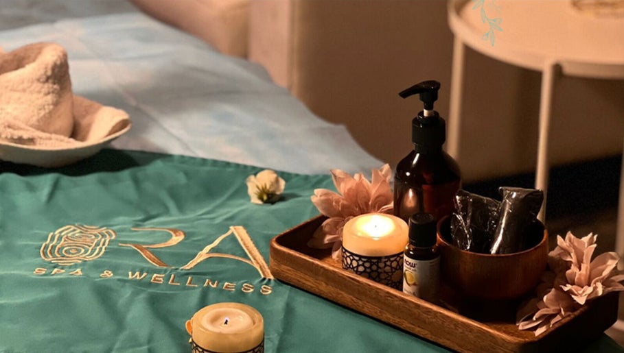 Relaxing setup at Ora Spa Home Service (Ladies Only), Riyadh, Riyadh Province, SA with candles and spa products.