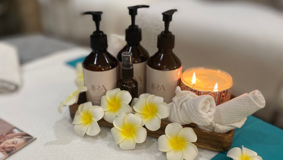Ora Spa Home Service essentials with flowers and candle, Riyadh, Riyadh Province, SA.