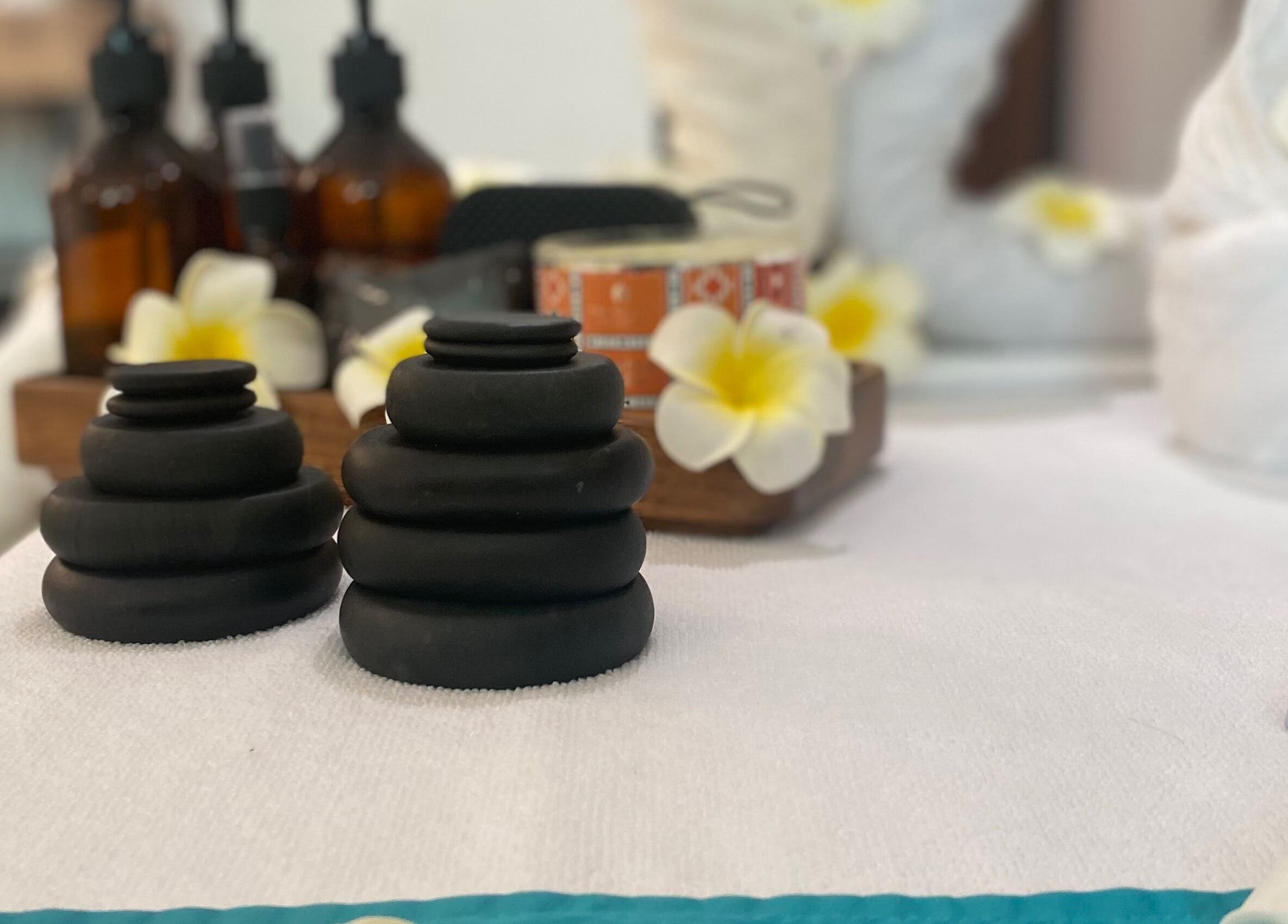 Relaxing spa setup with hot stones at Ora Spa Home Service (Ladies Only), Riyadh, Riyadh Province, SA.