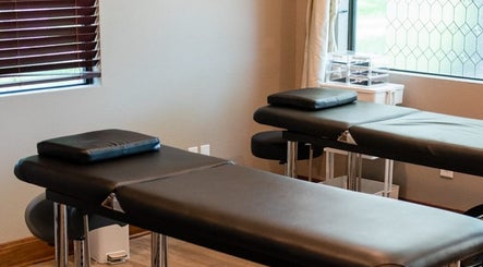 Serene massage tables at The Facial And Wellness Society in The Woodlands, Texas, US.