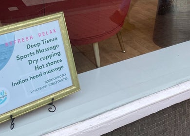 Sign at LZ Massage Therapies, Whitley Bay, England, GB, showcasing massage services offered, including deep tissue and hot stones.