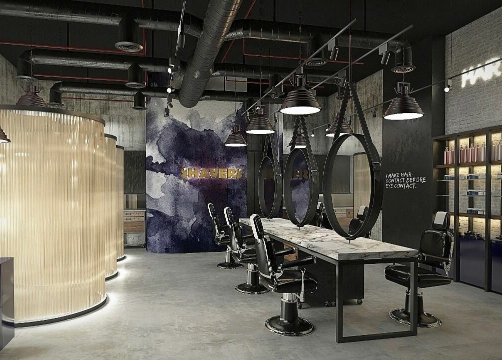 Modern interior of Shavers Gents Salon - Sobha Hartland, Dubai, Dubai, AE with stylish decor and barber chairs.
