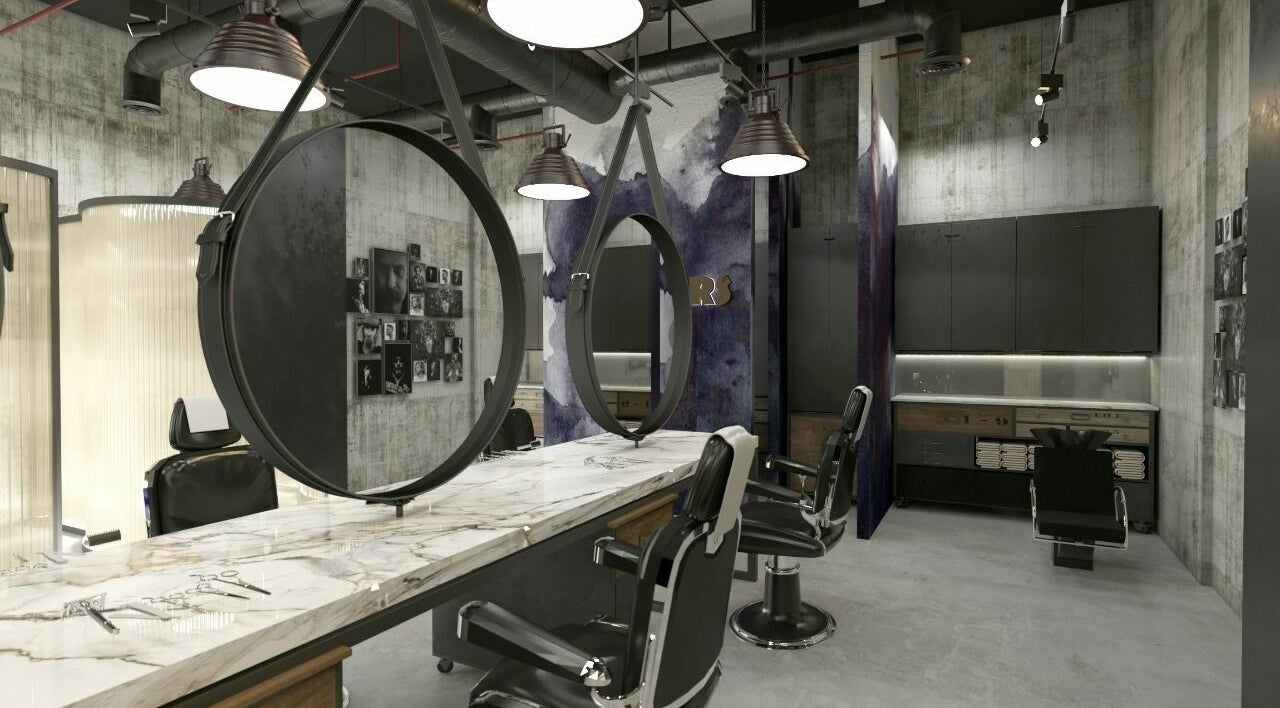 Interior of Shavers Gents Salon - Sobha Hartland in Dubai, Dubai, AE showcasing sleek barber chairs and mirrors.