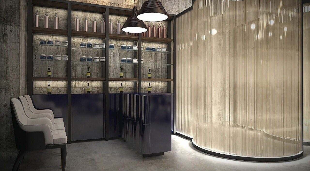 Chic interior of Shavers Gents Salon - Sobha Hartland in Dubai, Dubai, AE featuring stylish seating and shelves.