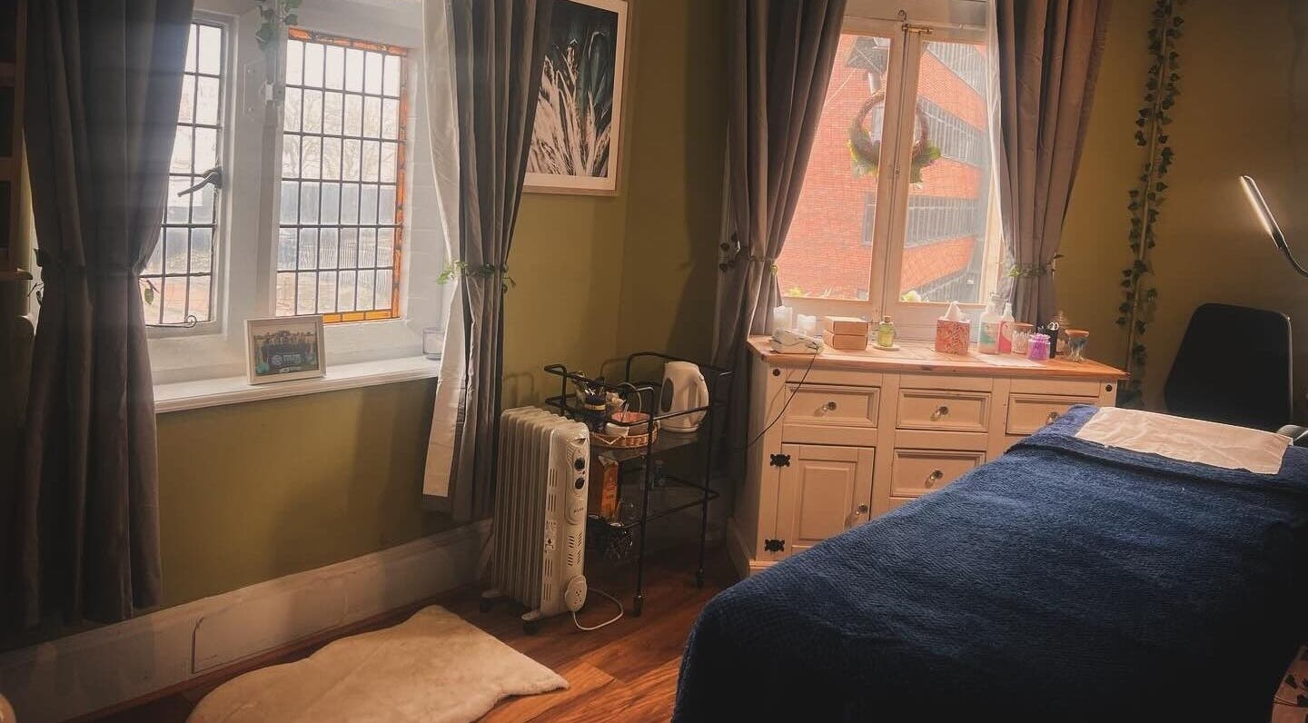 Cozy beauty room at Cassey’s Beauty & Training, Nuneaton, England, GB, featuring elegant decor and treatment bed.