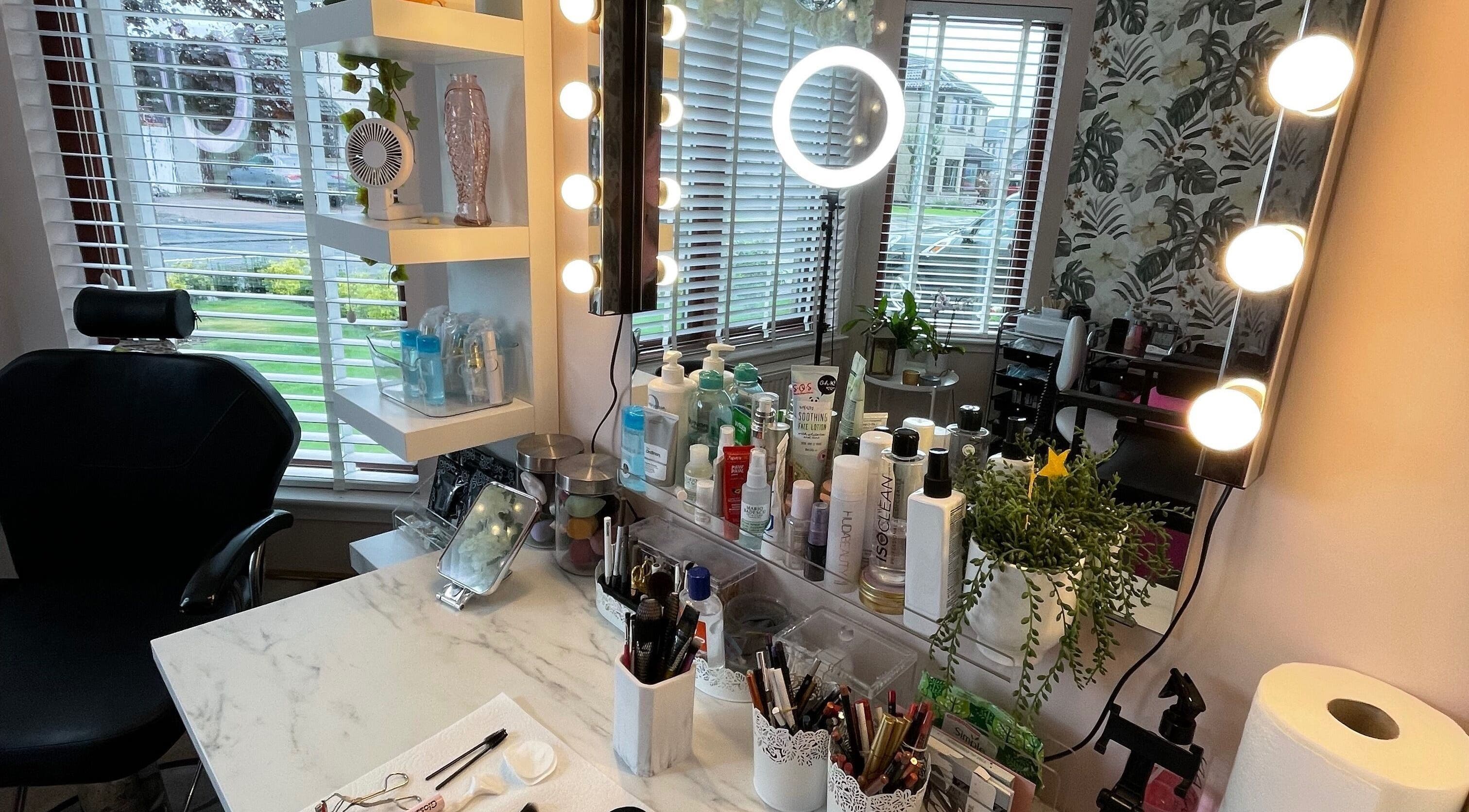 Beauty station at Go and Glow Makeup, Kinross, Scotland, showcasing makeup tools and skincare products.