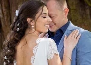 Wedding couple embrace with exquisite makeup by Go and Glow Makeup in Kinross, Scotland, GB.