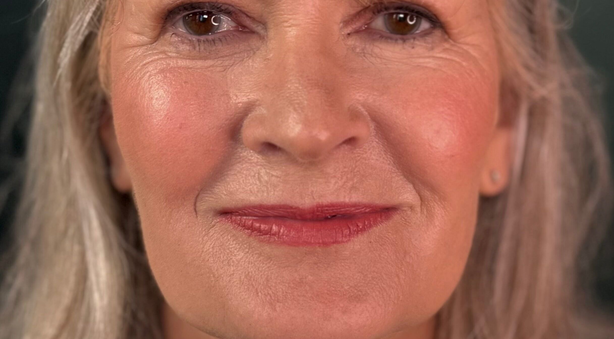 Close-up of mature woman with elegant makeup from Go and Glow Makeup, Kinross, Scotland, GB.