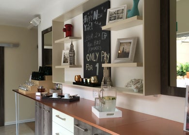 Stylish relaxation area at Urban Bliss Spa, Johannesburg, Gauteng, ZA with elegant decor and soothing ambience.