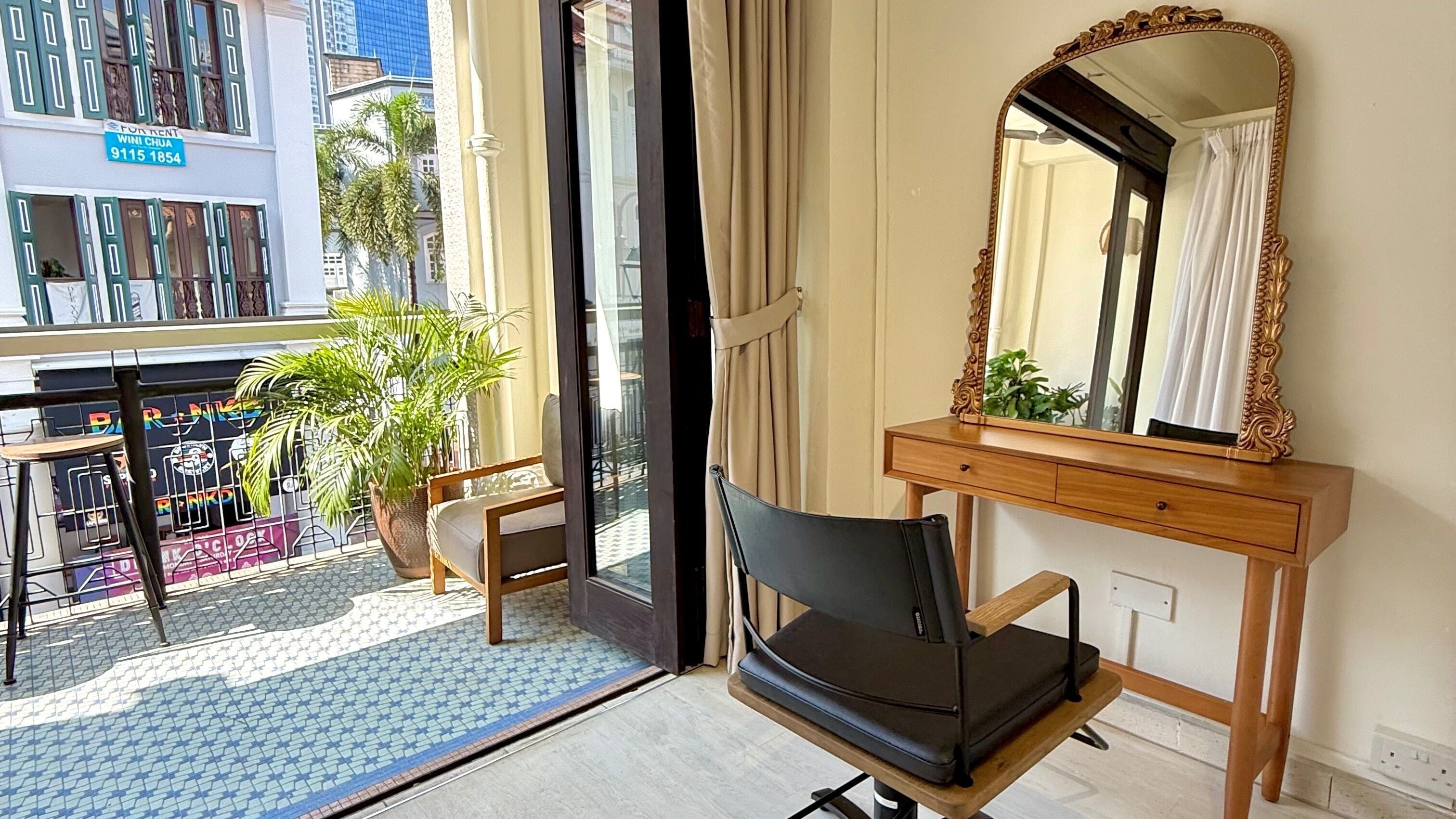 Bright beauty station at Sankakkei Club Street in Singapore, Singapore, SG with ornate mirror and greenery.