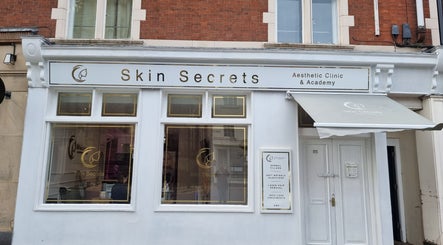 Front view of Skin Secrets Aesthetics in Derby, England, GB showcasing its clinic and academy entrance.