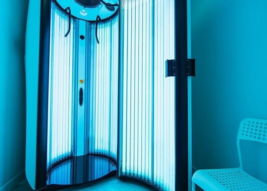 Modern tanning booth at Bronzed of Branksome, Poole, England, GB. Ideal for luxurious sun-kissed glow.