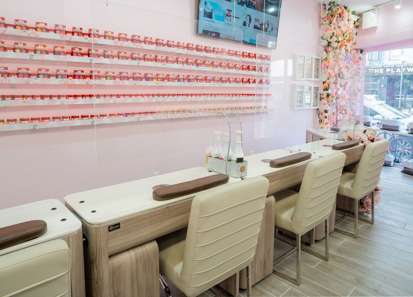 Elegant nail salon interior at Naild It Southie in South Boston, Massachusetts, US with stylish manicure stations.