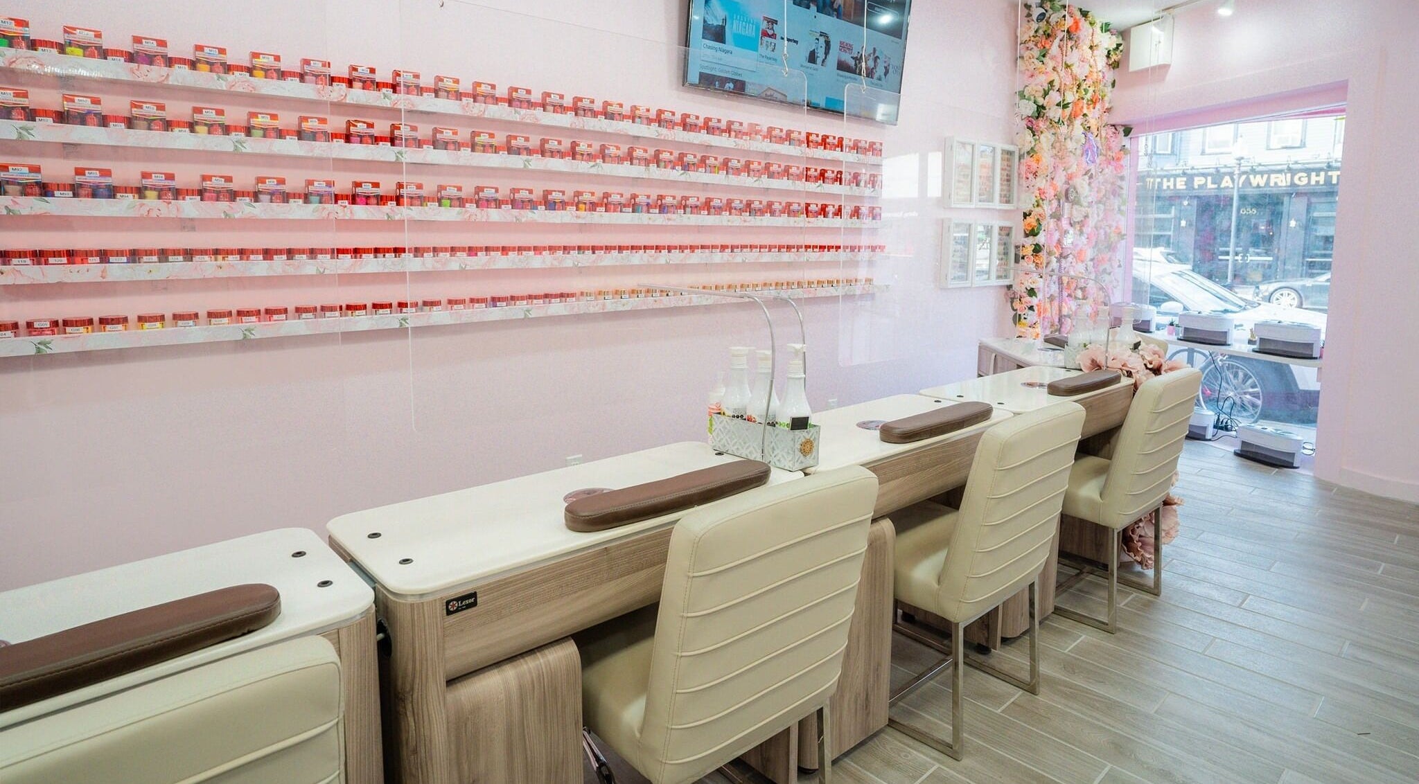 Elegant nail salon interior at Naild It Southie in South Boston, Massachusetts, US with stylish manicure stations.