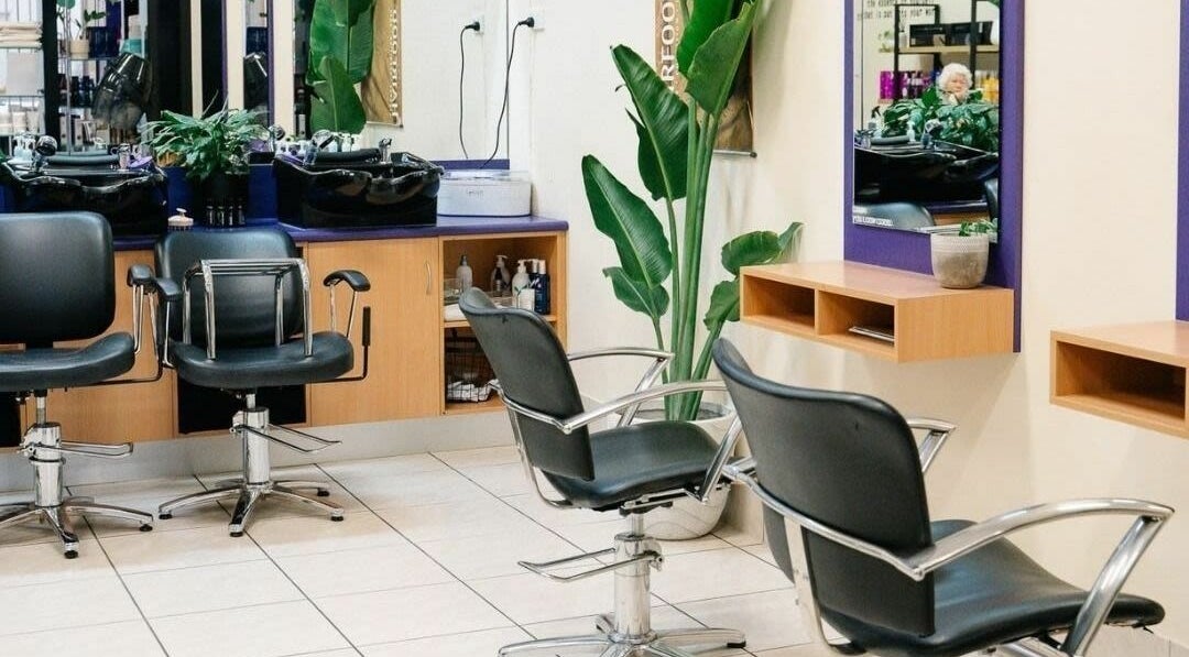 Modern salon chairs and mirrors at Meraki Curlz in Mount Sheridan, Queensland, AU.