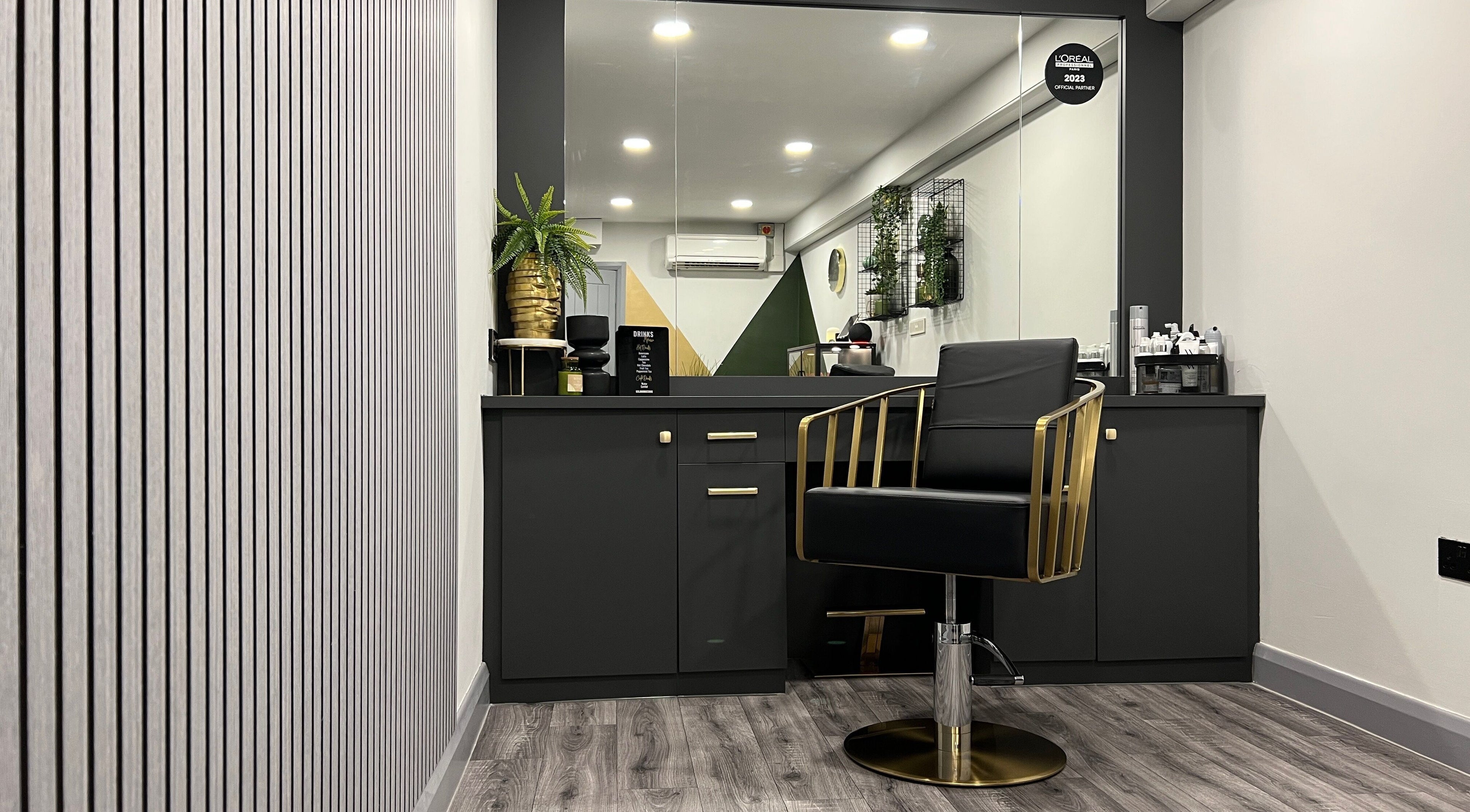 Elegant styling chair and modern decor at Benjamin Ross Hair, Derby, England, GB.