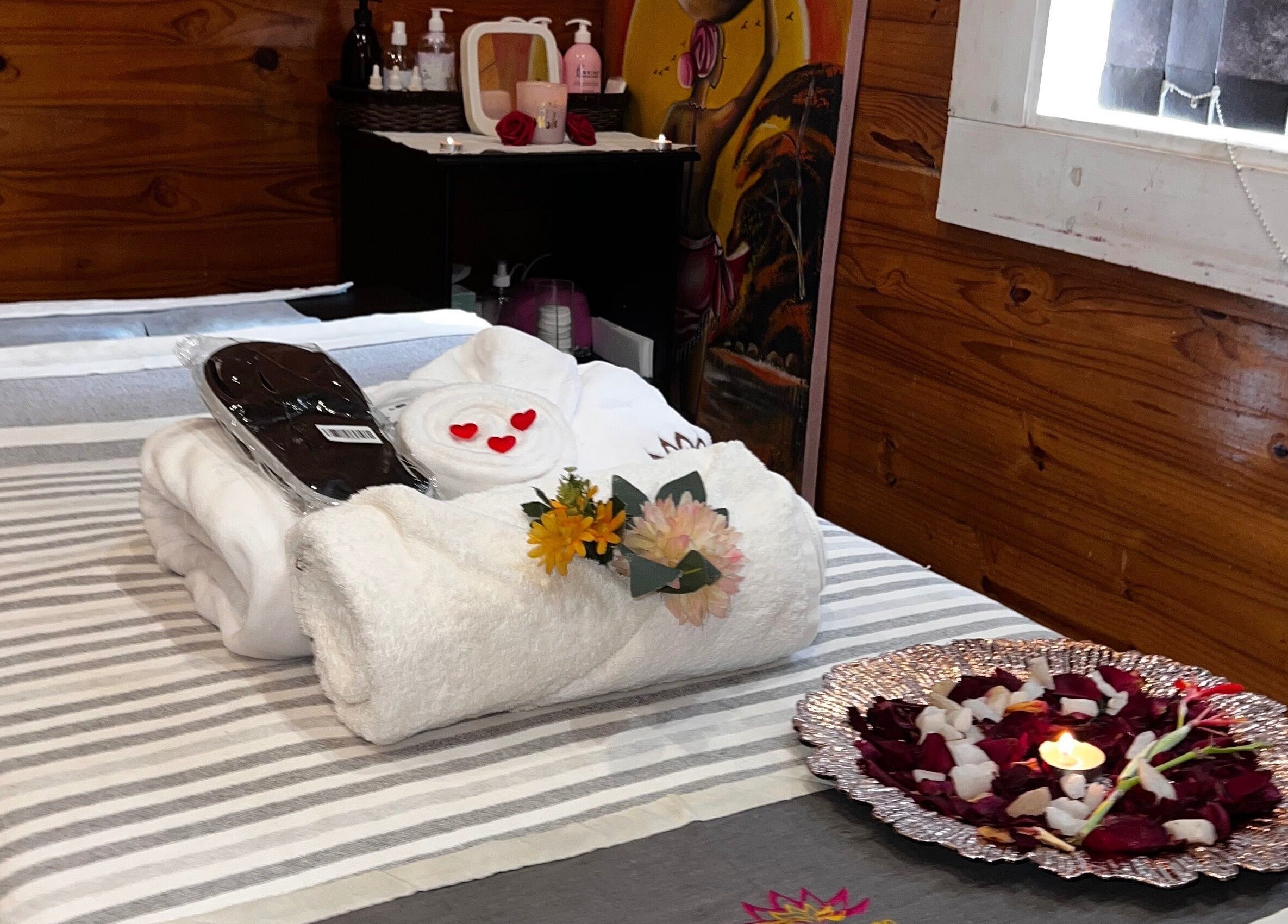 Luxurious spa setup at Pamper Haven Aesthetic Spa, Harare, Harare Province, ZW, featuring a relaxing towel display.