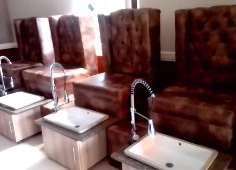 Elegant pedicure chairs at Pamper Haven Aesthetic Spa in Harare, Harare Province, ZW, offering relaxation.