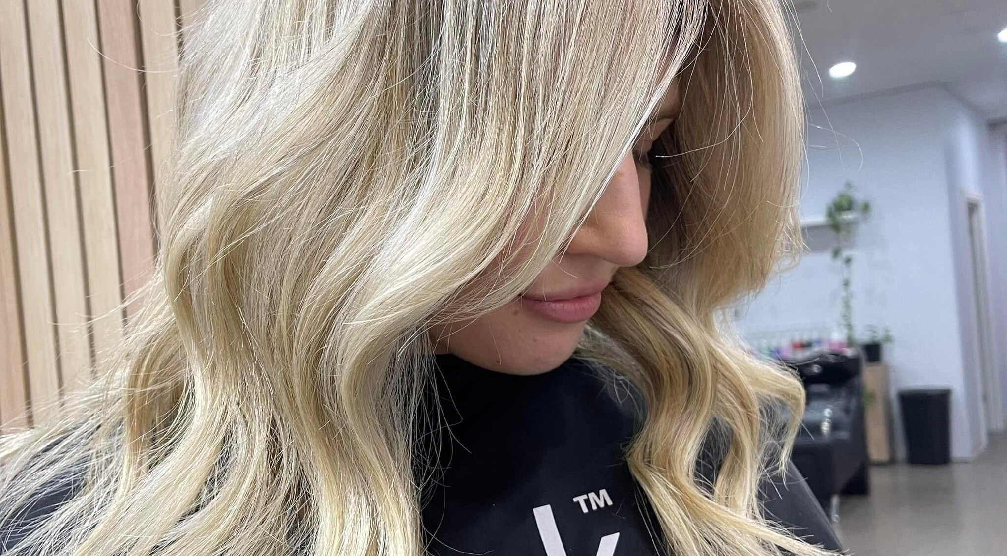 Elegant blonde waves styled at Studio 567 Hair & Beauty, Campbelltown, South Australia, AU.