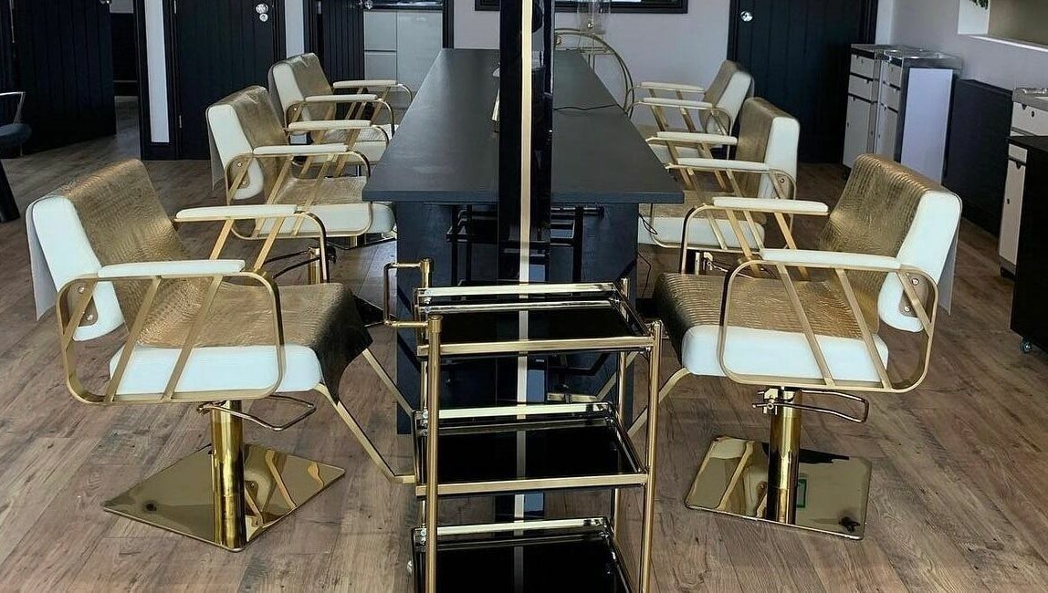 Luxurious salon chairs at Örro Hair and Beauty Salon in Rotherham, England, GB, showcasing modern elegance.