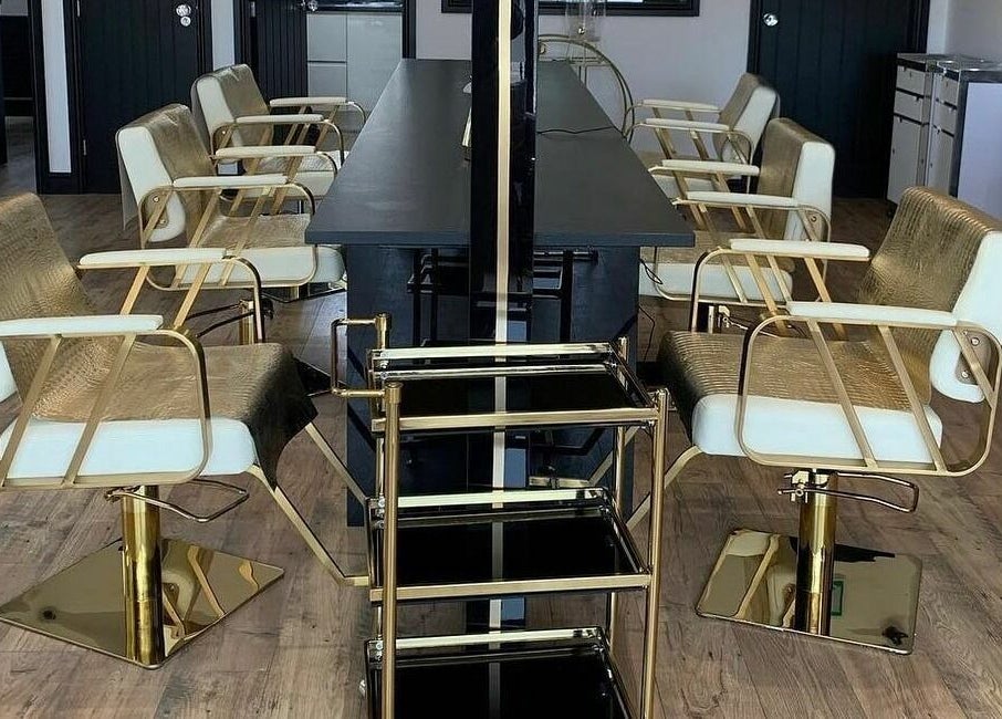 Luxurious salon chairs at Örro Hair and Beauty Salon in Rotherham, England, GB, showcasing modern elegance.