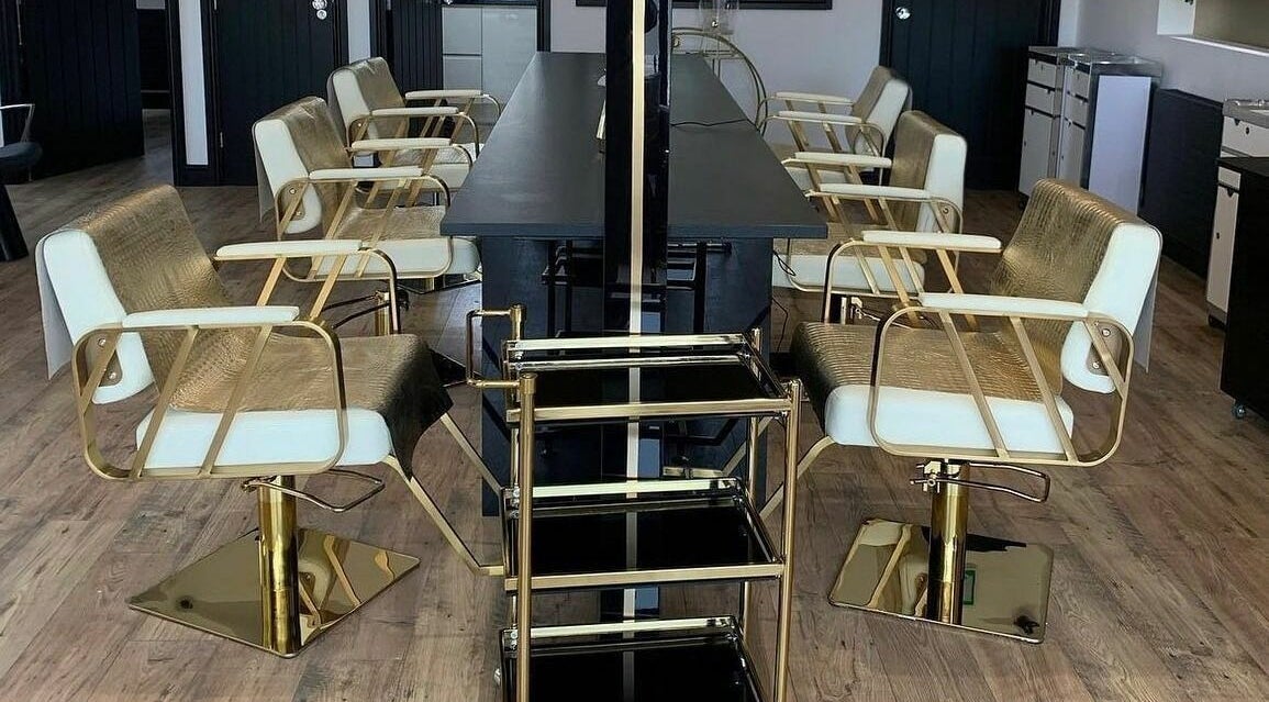 Luxurious salon chairs at Örro Hair and Beauty Salon in Rotherham, England, GB, showcasing modern elegance.