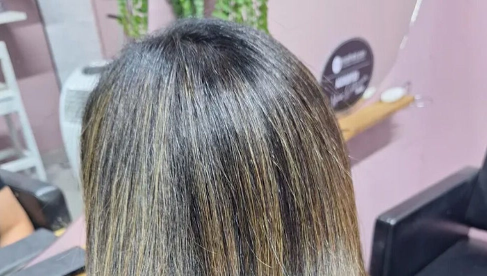 Freshly styled hair with highlights at My Hair Department in Cape Town, Western Cape, ZA salon.