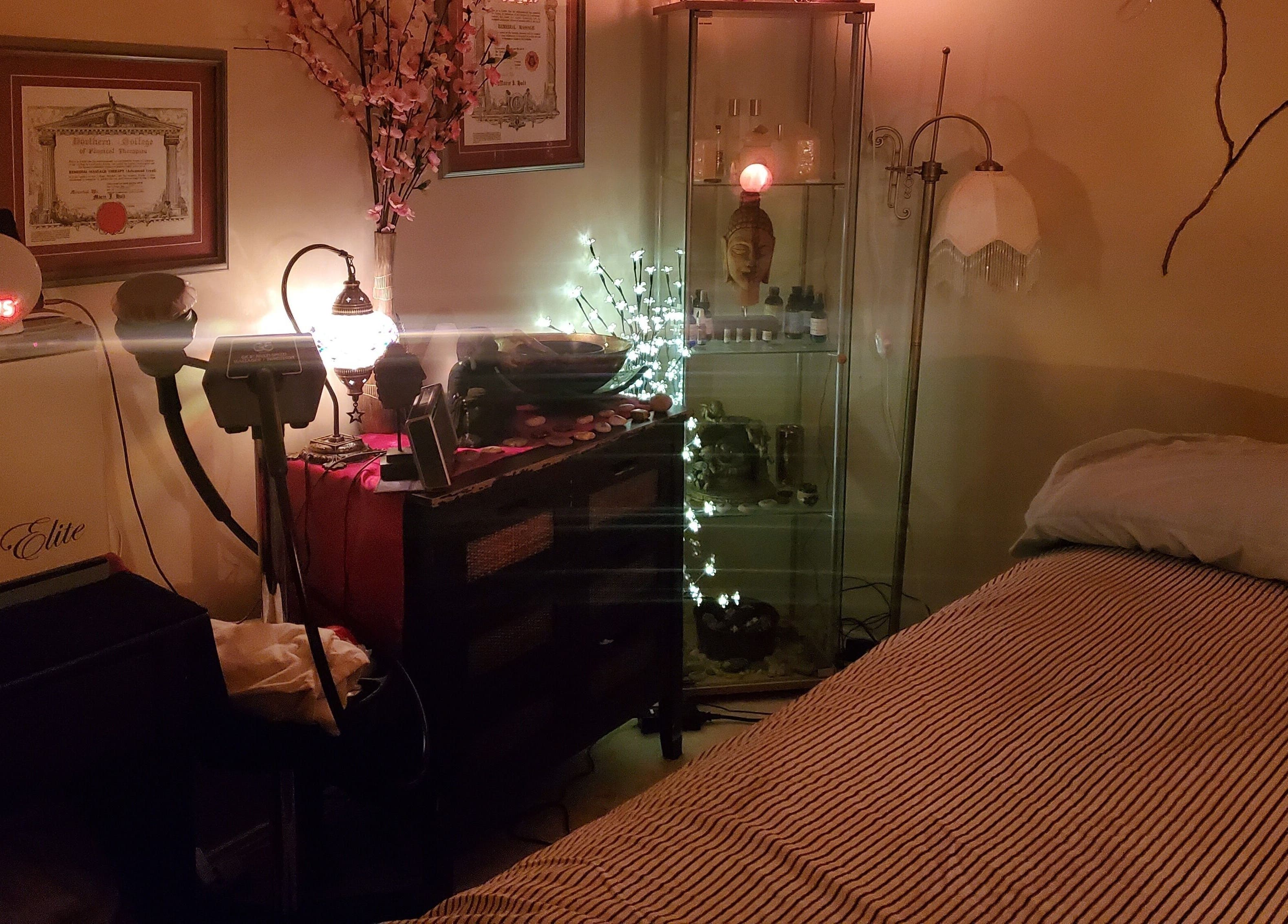 Cozy massage room at Got Your Back Therapeutic Massage Services, Stony Plain, Alberta, CA with serene lighting.