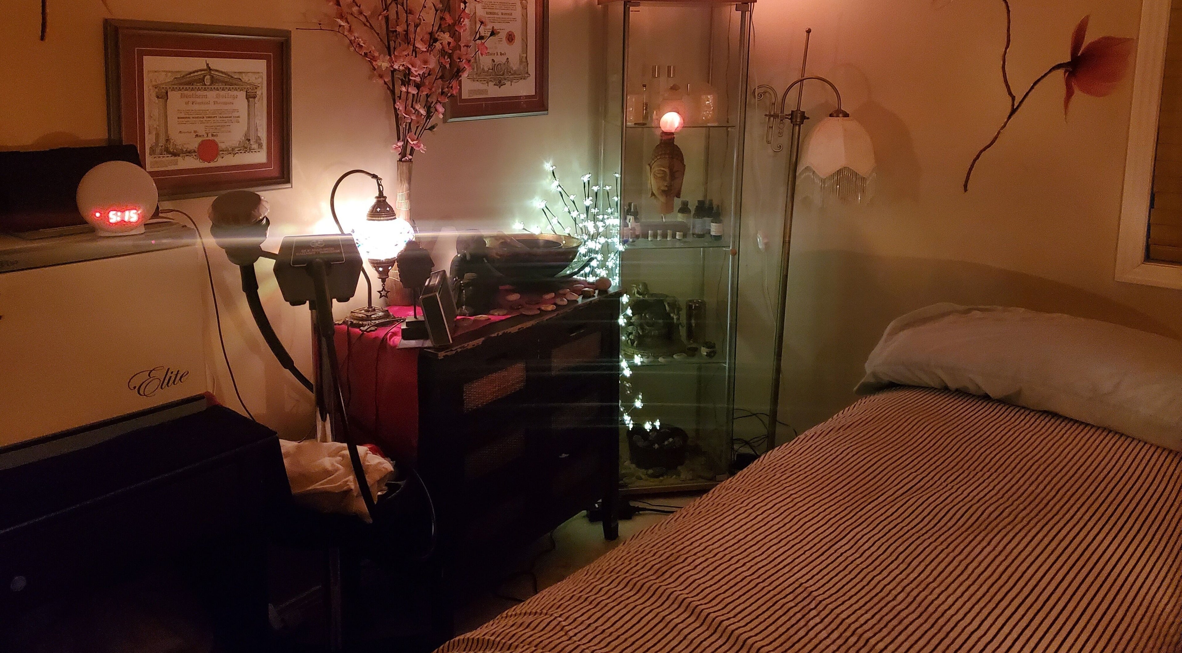 Cozy massage room at Got Your Back Therapeutic Massage Services, Stony Plain, Alberta, CA with serene lighting.