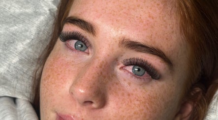 Close-up of a woman's eye with eyelash extensions at ByMaisy, Bexleyheath, England, GB.