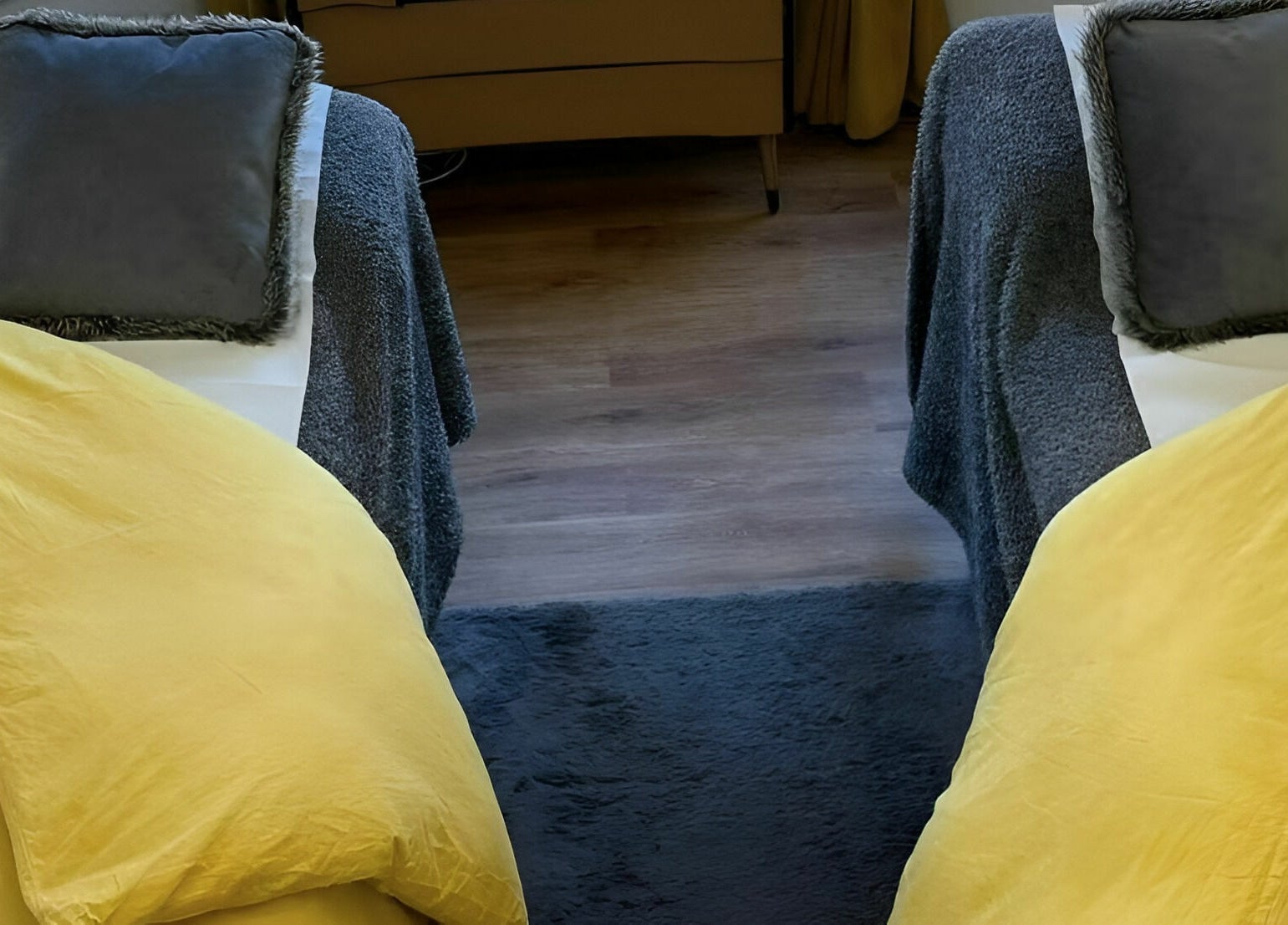 Inviting treatment setup at The Sunshine Store, Radcliffe on Trent, England, GB with plush yellow and grey decor.