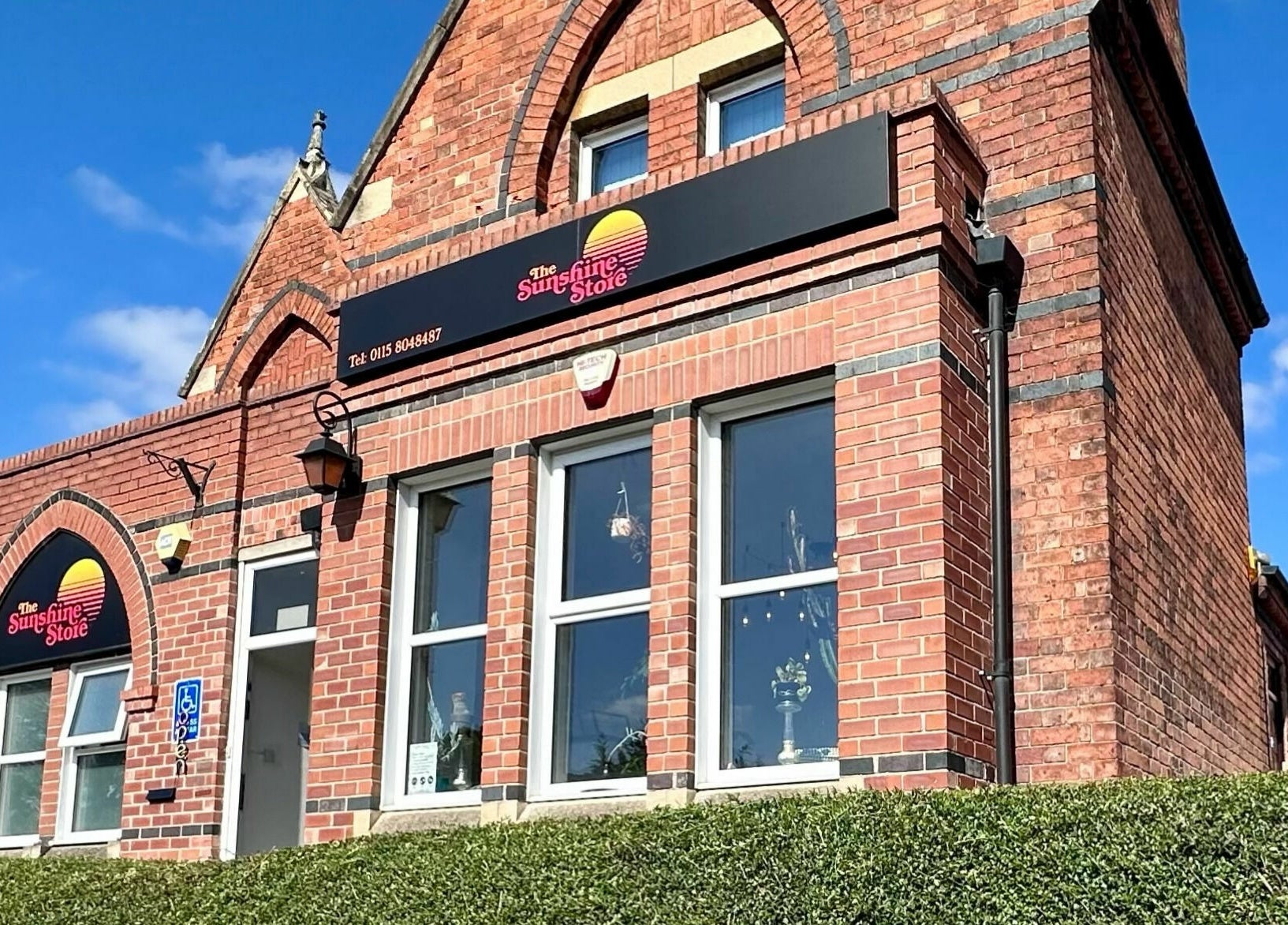 Front view of The Sunshine Store in Radcliffe on Trent, England, GB showcasing its brick architecture.