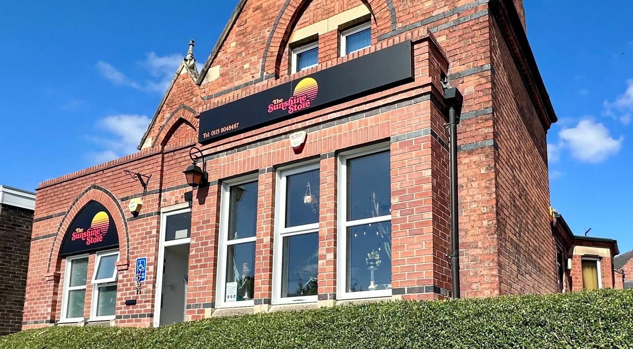 Front view of The Sunshine Store in Radcliffe on Trent, England, GB showcasing its brick architecture.
