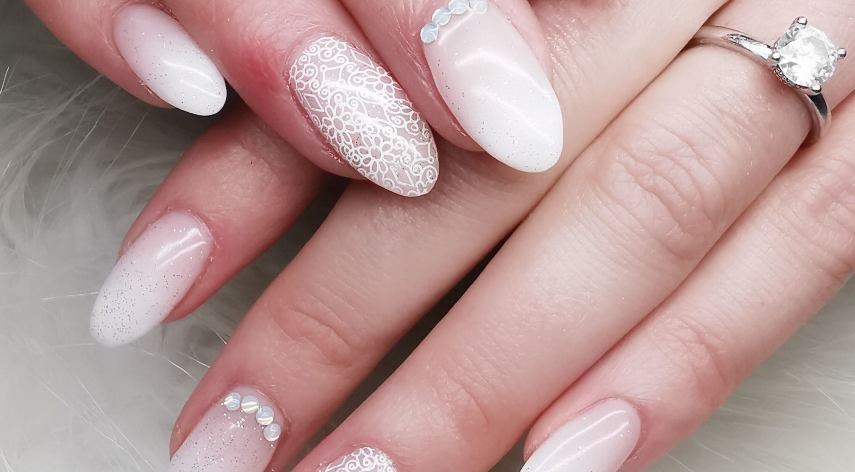 Elegant lace nail art at Nails.Com Potch in Potchefstroom, North West, ZA offers intricate beauty designs.